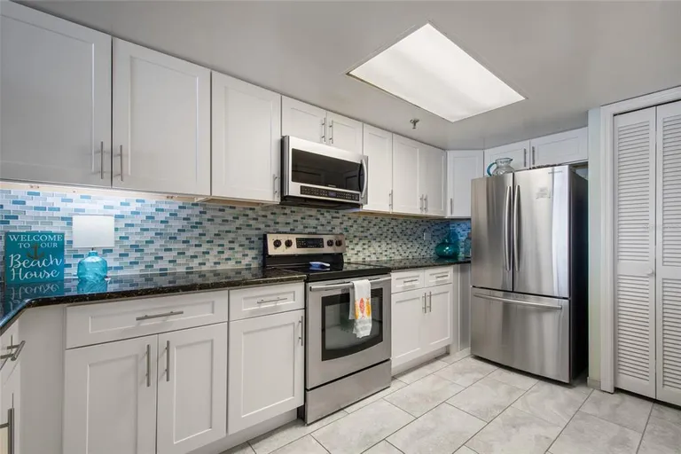 Central Florida Real Estate | View 6727 Turtlemound Road Unit# 417 | room 12 | View 13