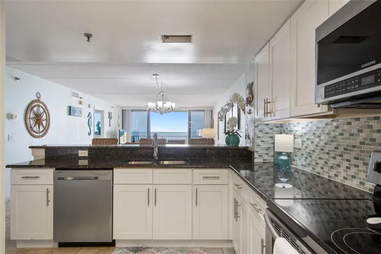 Central Florida Real Estate | View 6727 Turtlemound Road Unit# 417 | room 13 | View 14