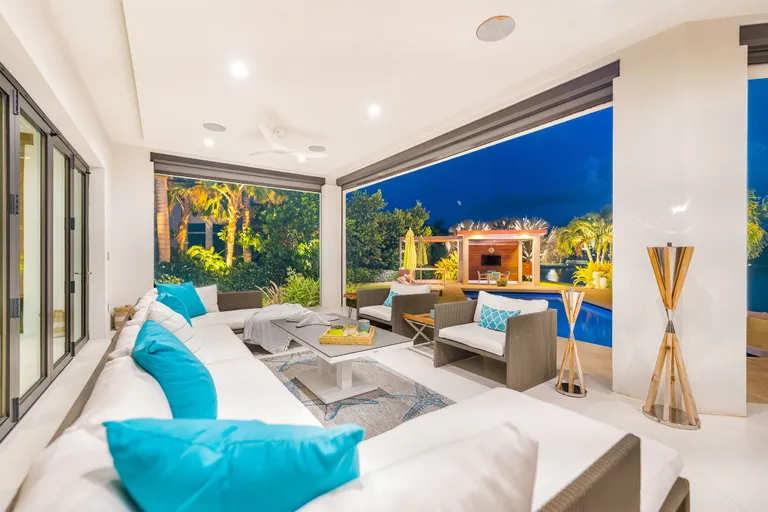 New York City Real Estate | View 90 Daum Quay Crystal Harbour | Patio at night | View 29