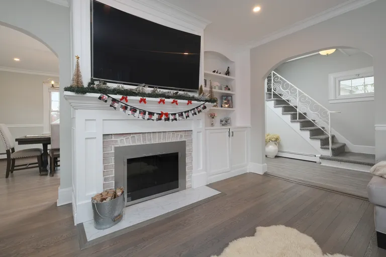 New York City Real Estate | View 15 1st Avenue | Living room w fireplace | View 9