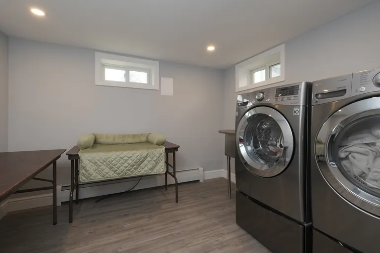 New York City Real Estate | View 15 1st Avenue | Laundry room in finished basement | View 8