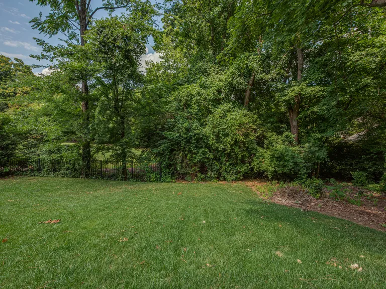 New York City Real Estate | View 2043 Sharon Lane | Flat rear yard with plentiful mature trees | View 34
