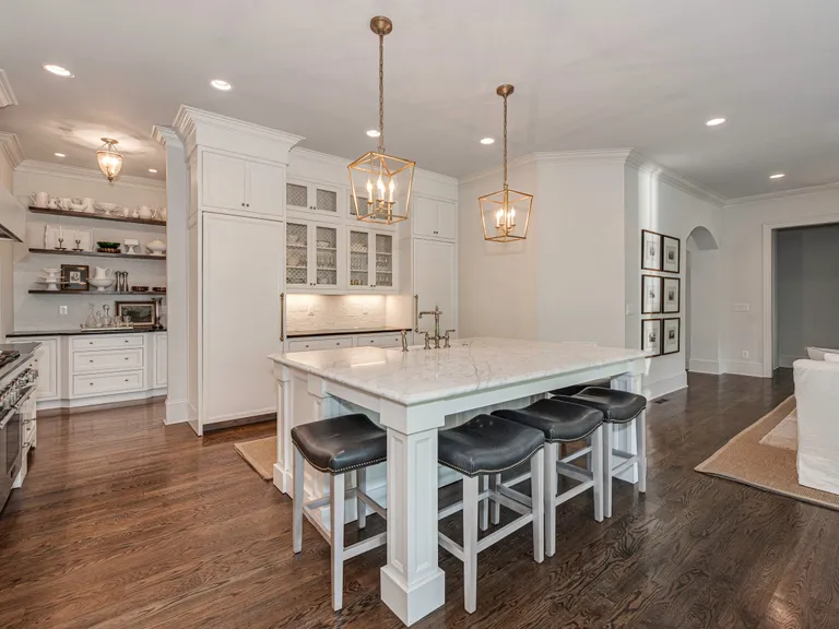 New York City Real Estate | View 2043 Sharon Lane | Spacious kitchen with custom cabinetry, marble countertops and Thermador appliances | View 7