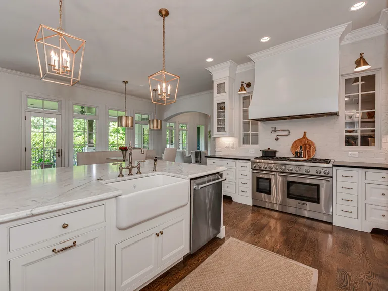 New York City Real Estate | View 2043 Sharon Lane | Stunning kitchen island provides copious seating and overlooks the covered porch | View 6