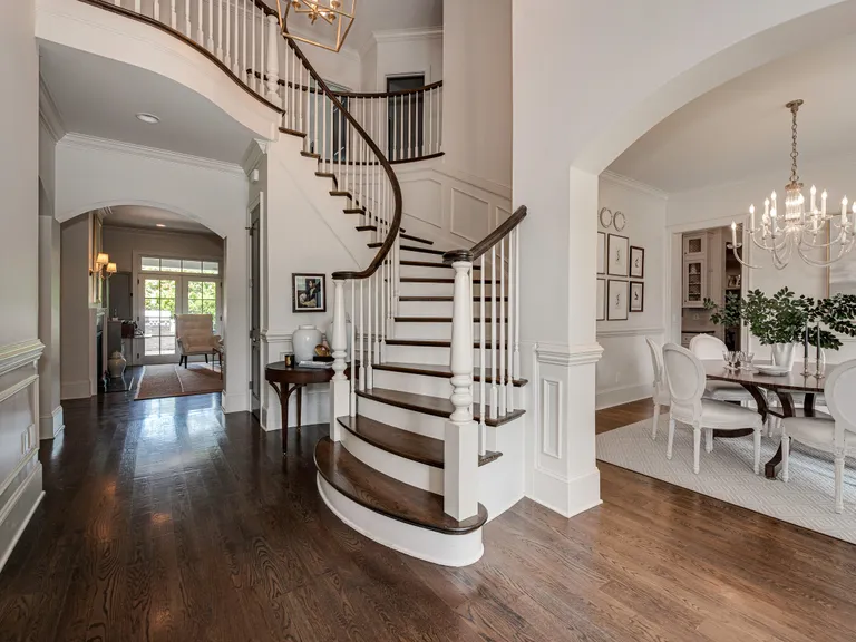New York City Real Estate | View 2043 Sharon Lane | Welcoming foyer with elegant curving staircase | View 3