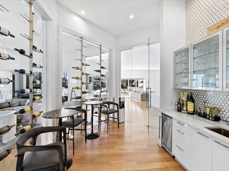 New York City Real Estate | View 3612 English Garden Drive | Glass enclosed Wine/bourbon room | View 12