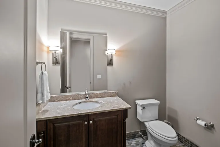 New York City Real Estate | View 9520 Heydon Hall Circle | Lower Level Powder Room | View 35
