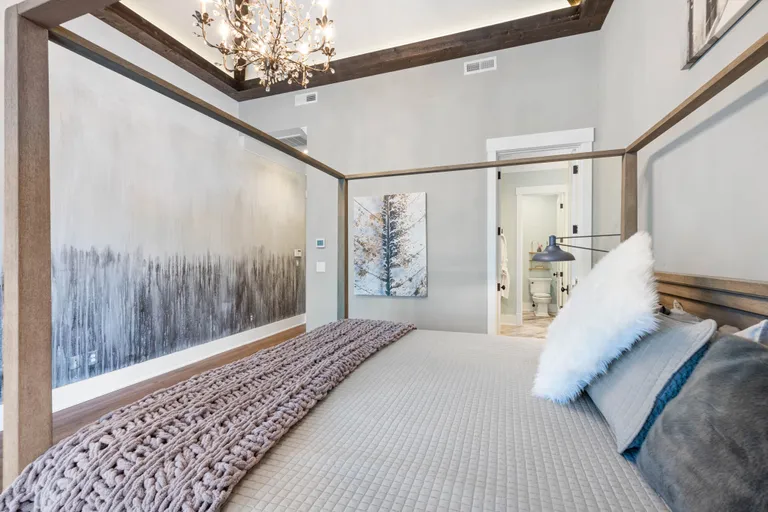 New York City Real Estate | View 7334 Lakeridge Drive | Primary Bedroom with Custom Painted Accent Wall | View 20