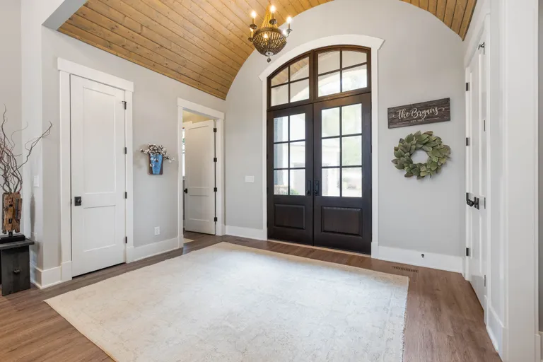 New York City Real Estate | View 7334 Lakeridge Drive | Foyer with Barrel Ceiling | View 6