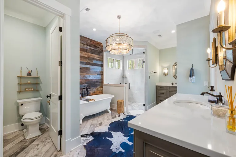 New York City Real Estate | View 7334 Lakeridge Drive | Primary Bath with Separate Vanities and Water Closet | View 21