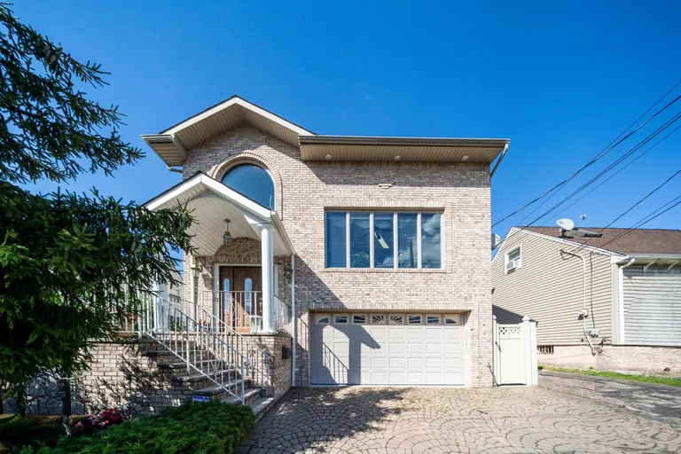 Jersey City/Hoboken Real Estate | View 361 Roosevelt Ave | 4 Beds, 3 Baths | View 1