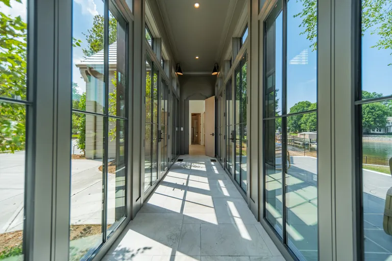 Charlotte Real Estate | View 18000 Whispering Oaks Drive | Breezeway | View 36