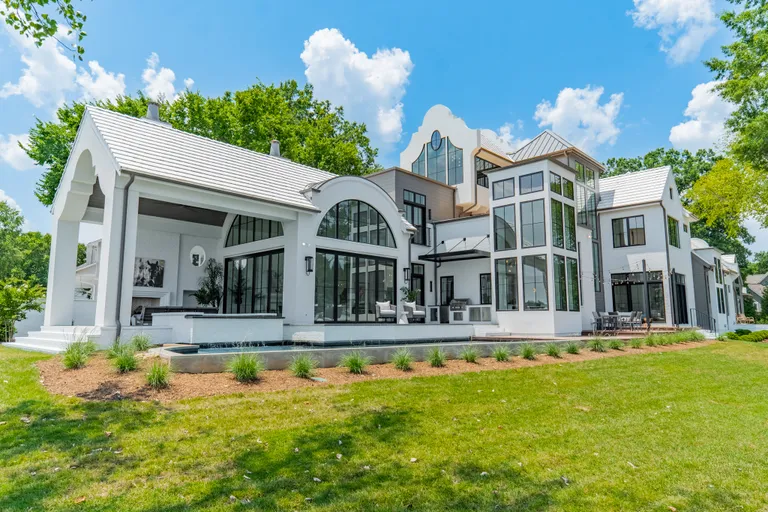 Charlotte Real Estate | View 18000 Whispering Oaks Drive | Side Elevation | View 7
