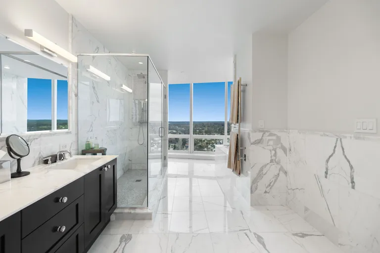 New York City Real Estate | View 1 Broad Street PHD3 | Primary Bath with Carrera Marble | View 17