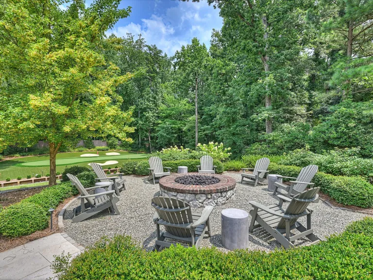 New York City Real Estate | View 1917 Bent Branch Drive | Fire Pit overlooking Putting Green next to Pool | View 35