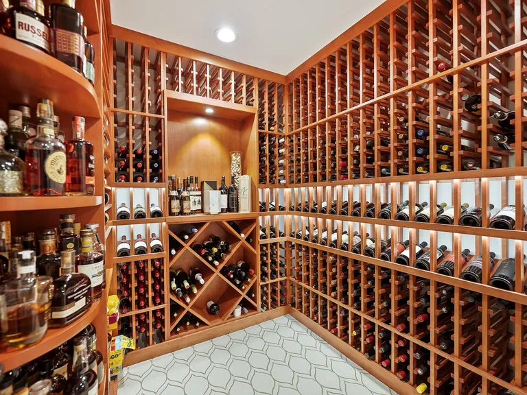 New York City Real Estate | View 2414 Island Lake Drive | Lower Level Wine Cellar | View 38