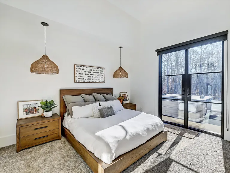 New York City Real Estate | View 1525 Shinnville Road | Primary bedroom with oversized dual closets and private balcony with new Bullfrog outdoor Spa | View 32