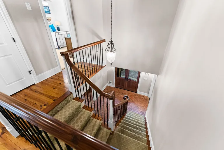 New York City Real Estate | View 5010 Sentinel Post Road | Stairs ro Second Floor | View 36