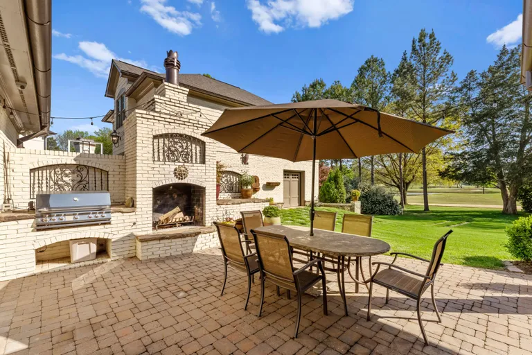 New York City Real Estate | View 5010 Sentinel Post Road | Outdoor Dining with Fireplace | View 26