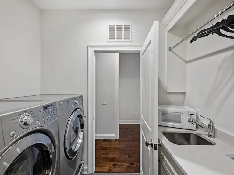 New York City Real Estate | View 4049 City Homes Place | Laundry Room | View 44