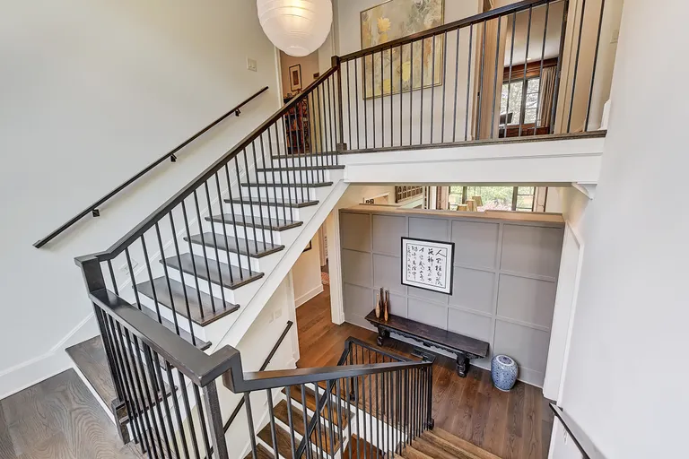New York City Real Estate | View 125 Quiet Waters Drive | Staircase | View 21
