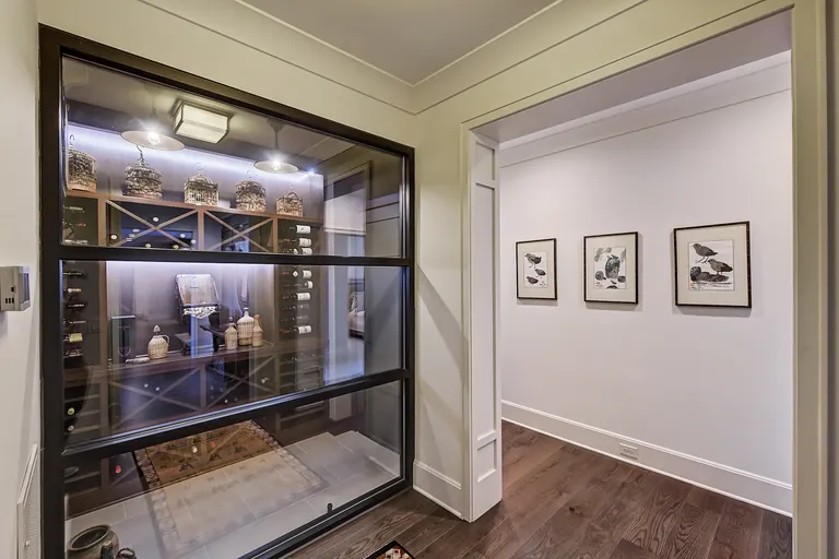New York City Real Estate | View 125 Quiet Waters Drive | Wine Room | View 32