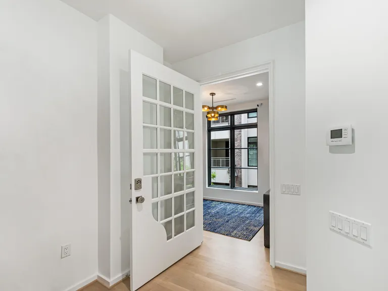 New York City Real Estate | View 1333 Queens Road #E2 | Entry Door | View 4