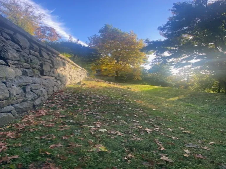 New York City Real Estate | View 108 Phillipse Place | Resized - Phillipse_Back of Property, West Stone Wall | View 2