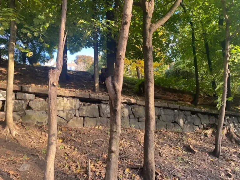New York City Real Estate | View 108 Phillipse Place | Resized - Stone Wall, street level at 108 Phillipse Place | View 3