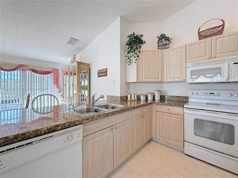 South Florida Real Estate | View 4356 NW 1st St | Listing | View 8